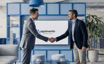 Two business partners shaking hands