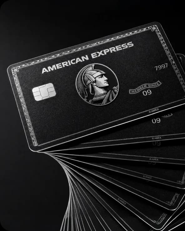 American Express Centurion cards fanned on a dark background