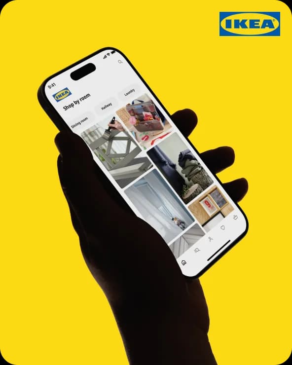 Hand holding a phone with the IKEA shopping app